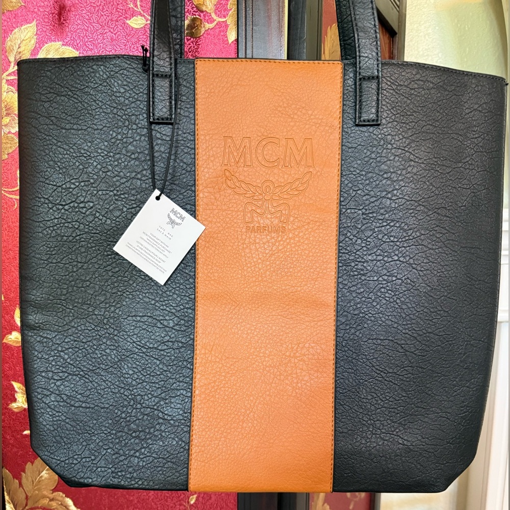 NWT MCM PARFUMES BLACK AND COGNAC BROWN FAUX LEATHER LOGO EMBOSSED TOTE